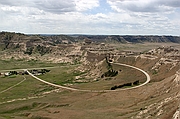 Looking down from atop Scotts Bluff down at the visitor center.\nScotts Bluff National Monument.