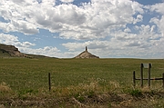 Chimney Rock near Scotts Bluff, Nebraska. One of the first\nlandmarks to be seen by pioneers after weeks of traveling\nthe plains.